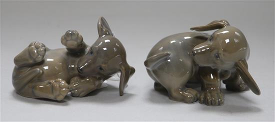 Two Royal Copenhagen models of dachshund puppies